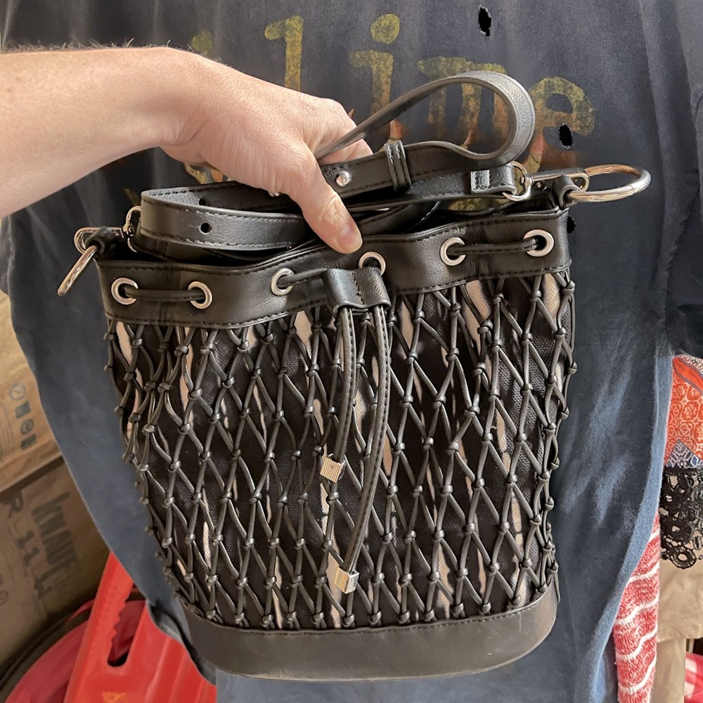 INC luci drawstring crossbody